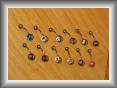 Bijoux avec logo en titane pour /et apr�s le per�age 35$